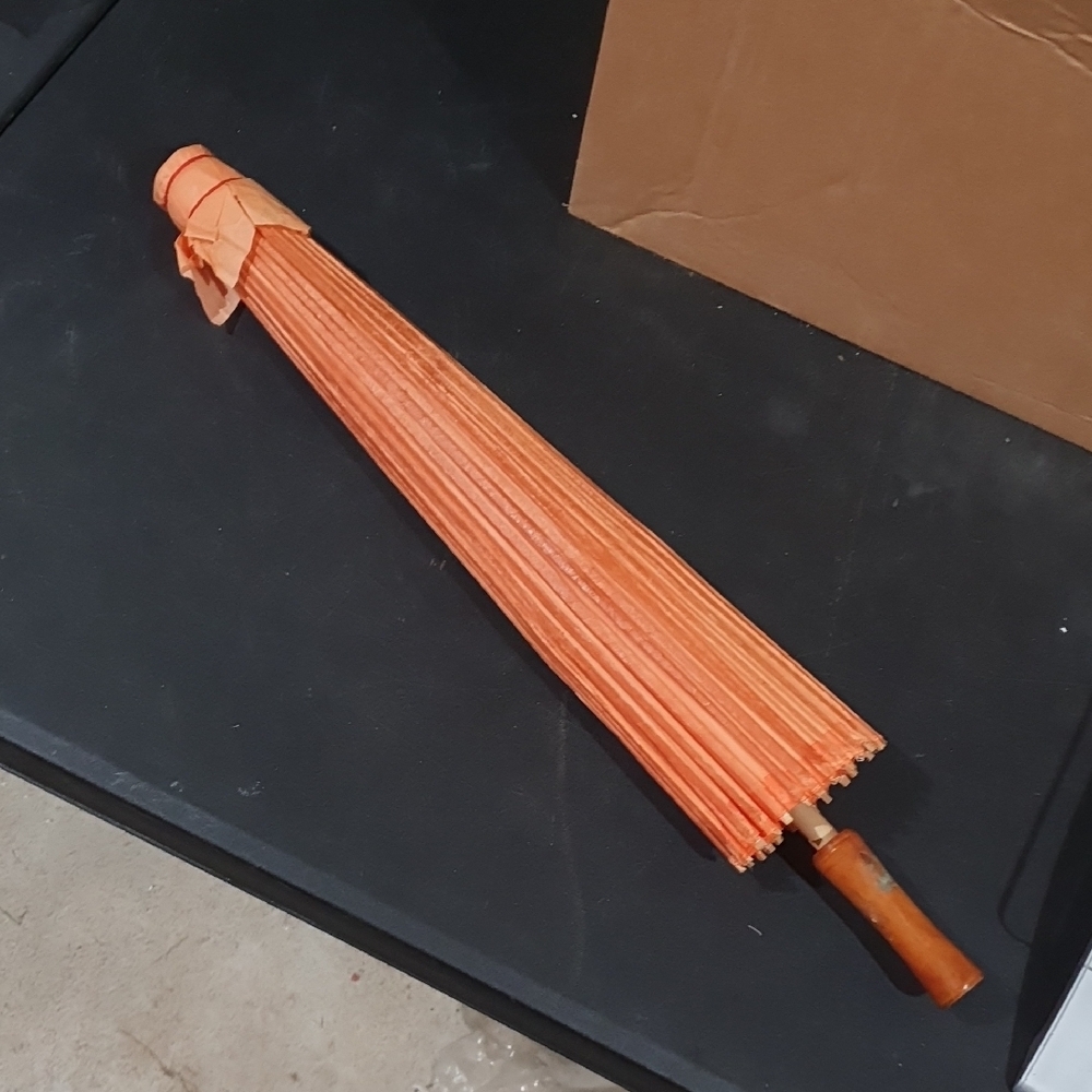 Vibrant Orange Parasol with Wooden Handle